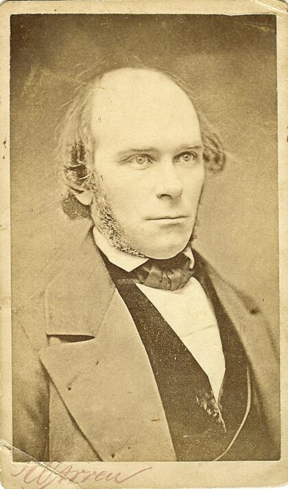 yellowish photo of a nineteenth century man in a suit